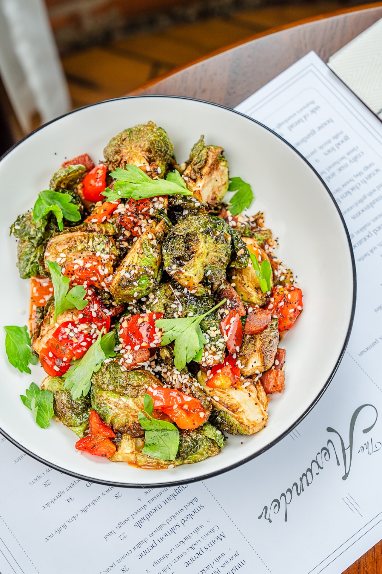 Chef-prepared seasonal dish at The Alexander