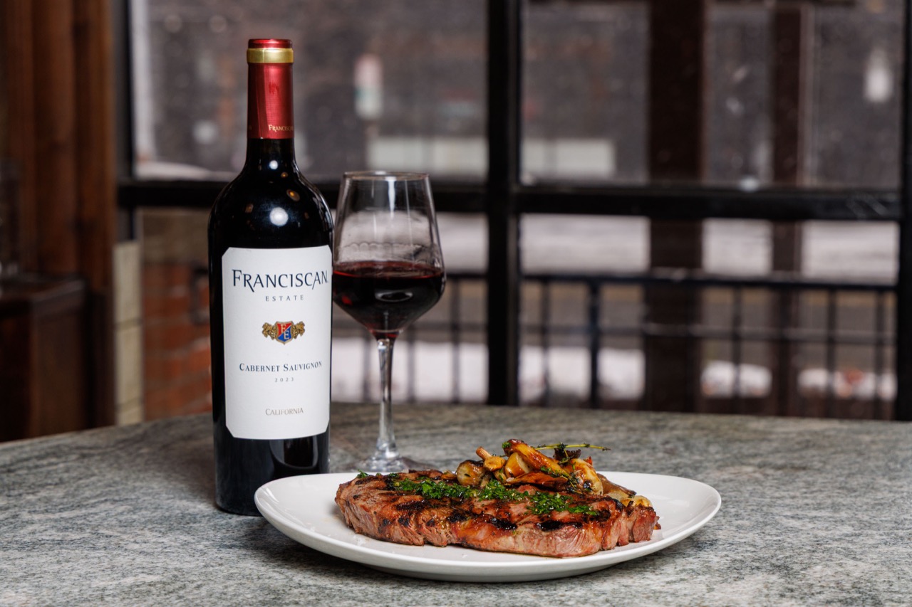 Steak paired with wine at The Alexander