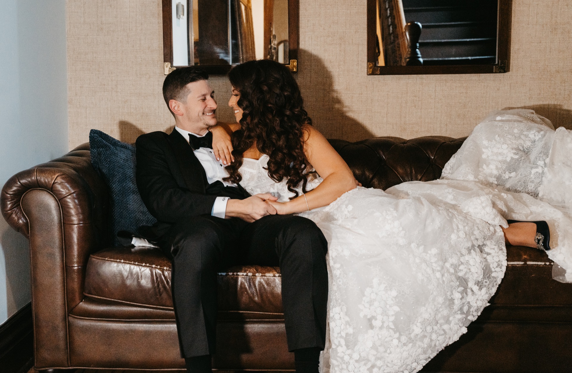 Wedding reception with elegant table settings and floral arrangements